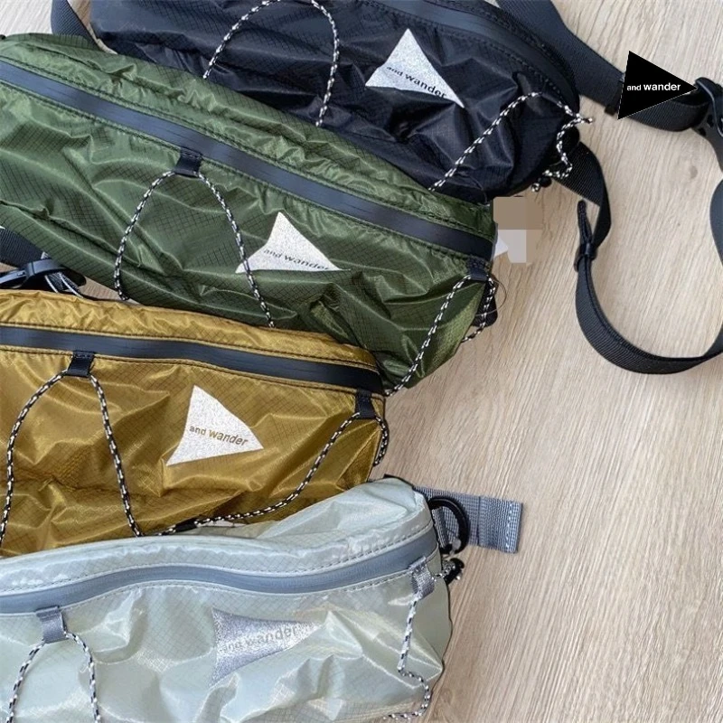 And Wander Outdoor Sling Waist Bag,Lightweight Water‑Repellent Mini Crossbody Pack with Triangle Logo for Hiking Travel