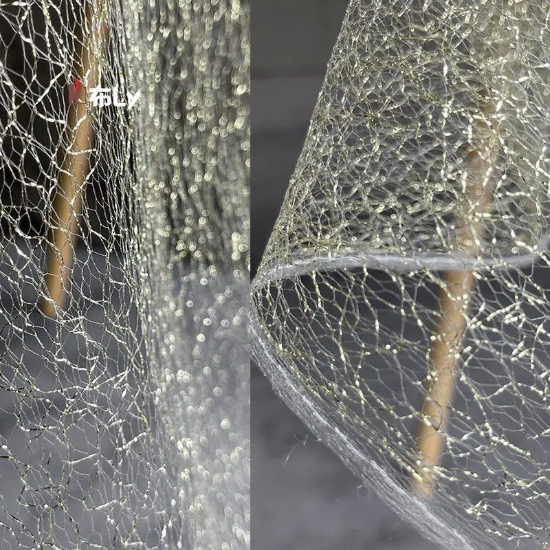 

Gold glitter mesh hollow soft fabric high-end wedding dress background decoration handicraft clothing designer fabric