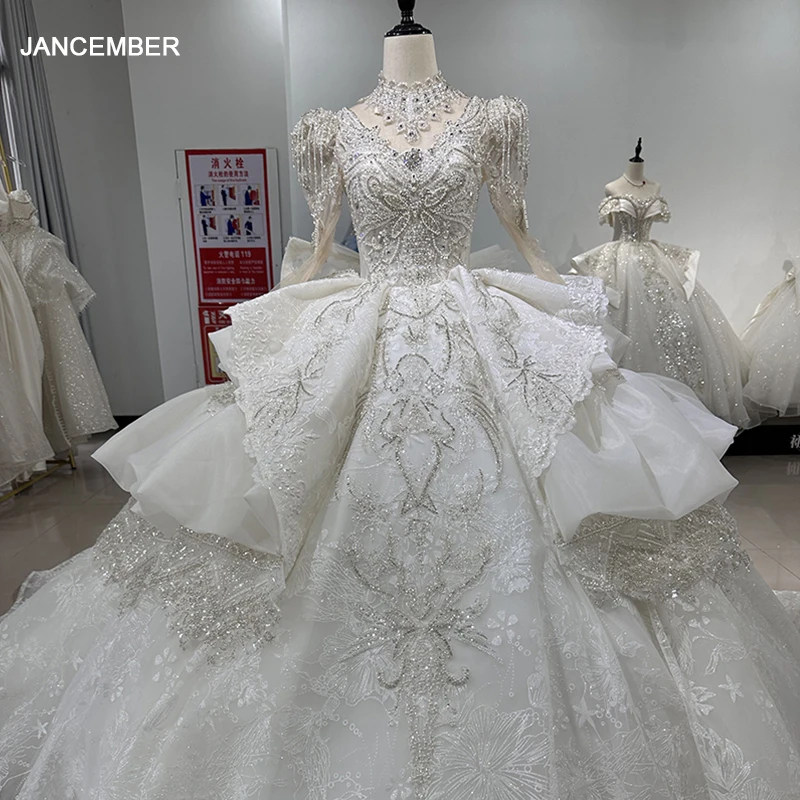 Abito da sposa Sexy di lusso avorio di fascia alta personalizzato Dubai maniche lunghe abito da sposa con perline di diamanti su misura XS005