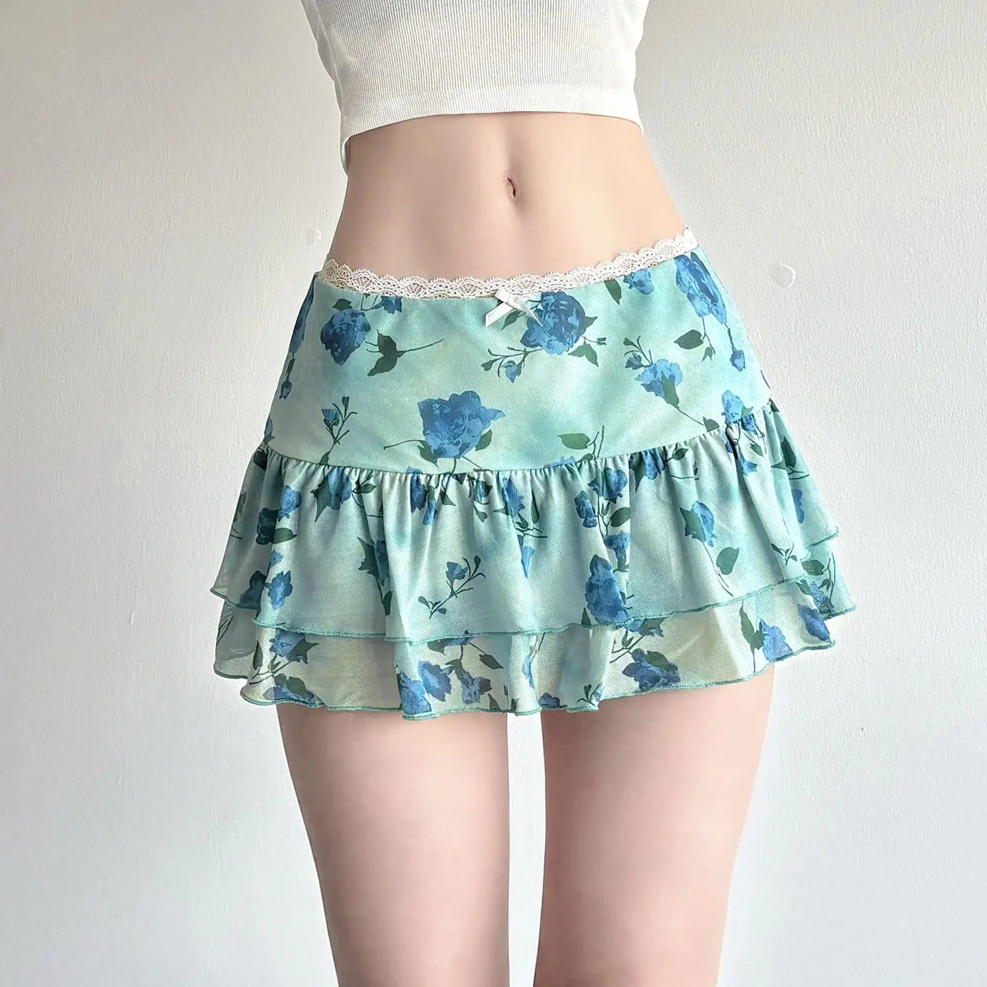 تنورة كعكة شبكية وردية مطبوعة باللون الأخضر المقرمش، تنورة هوتي منخفضة الخصر من الدانتيل الحلو والحار