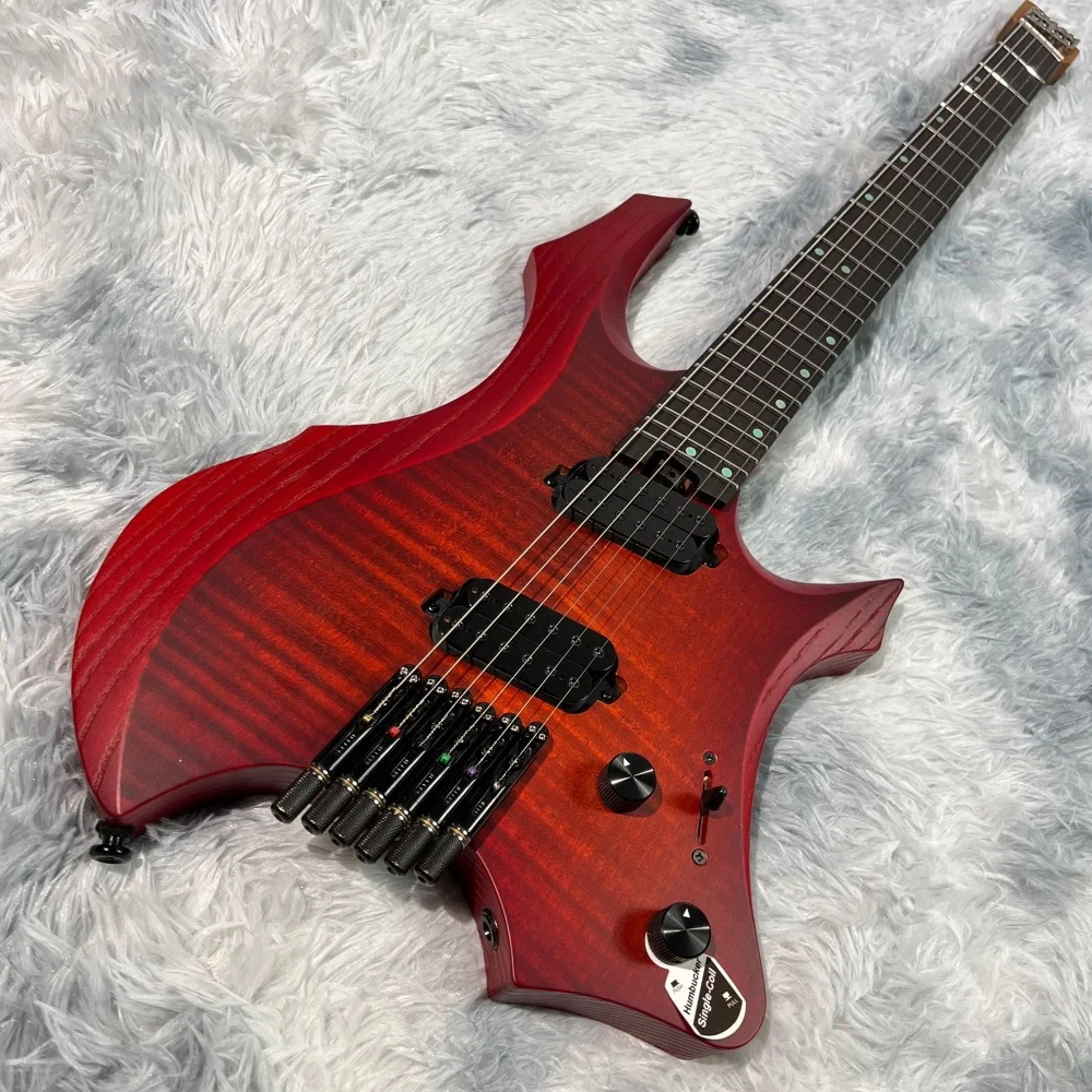6-string headless electric guitar; fanned frets; titanium alloy string lock; bone nut; tiger stripe veneer; stainless steel fret