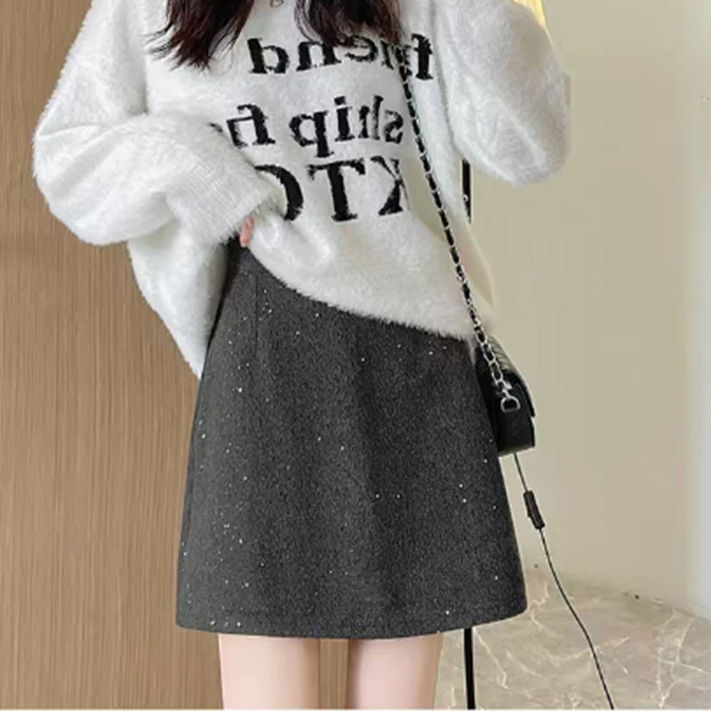 กระโปรงทรงเอไลน์ผู้หญิงแฟชั่นเกาหลี ประดับเลื่อมวิบวับ เอวสูง ทรงเข้ารูป กระโปรงสั้น ผู้หญิง ฤดูใบไม้ร่วง ฤดูหนาว ซิป สีเทา