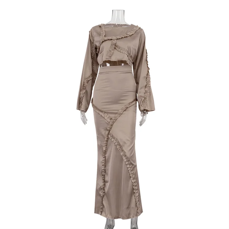 2025 Nuovo stile di moda Set da donna irregolare con bordo in foglia di loto manica superiore gonna avvolgente sui fianchi Set da due pezzi