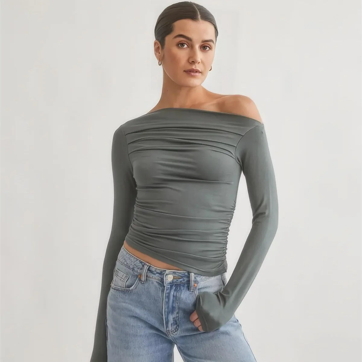 

Cross border popular new solid color slanted shoulder pleated tight fitting waist slimming casual women's long sleeved T-shirt