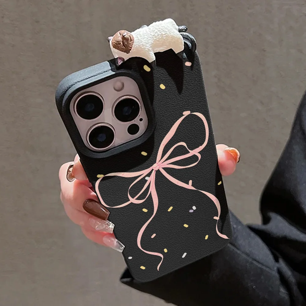 شريط فيونكة مع حافظة قطة لطيفة ثلاثية الأبعاد لهاتف آيفون 17 11 برو ماكس اير 15 12 13 14 16 برو ماكس 16 بلس آيفون 17 آيفون 11 غطاء مقاوم للصدمات