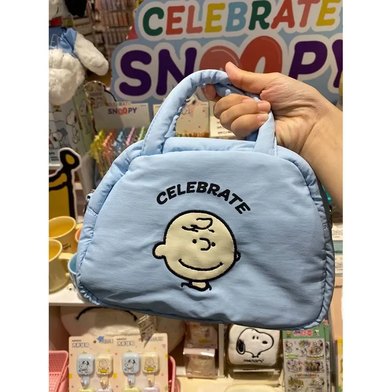 

MINISO Snoopy Cute Crossbody Bag Cartoon Blue Handheld Pen Bag Capacity Makeup Bag for Girls Milk Whispering Storage Bag