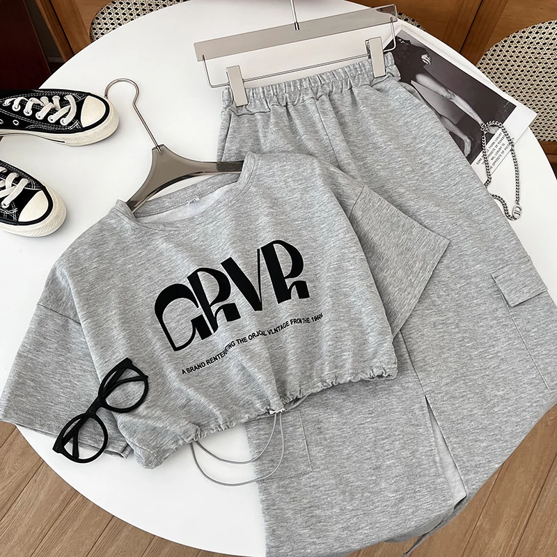 

Women's Summer Set Fashion Letter Printed Drawstring Short Sleeve T-shirt+Elastic Waist Split Mid-length Half Skirt 2024 New