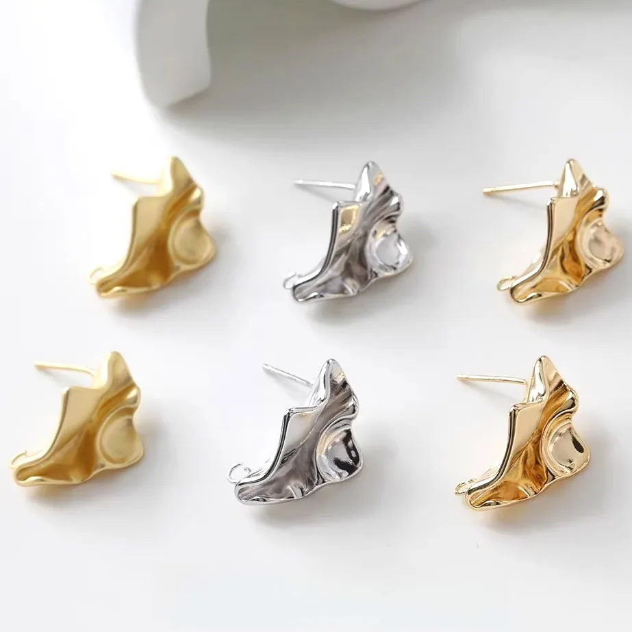 

1 pair of copper alloy plated with 14K gold/silver to retain color, irregular concave-convex surface diy handcrafted earrings