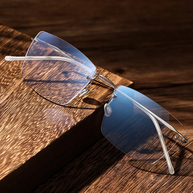 

The New Frameless Men's Glasses, Made of Titanium Alloy Exude A High-end Feel Women Feature A Retro Light Luxury Frame for Men