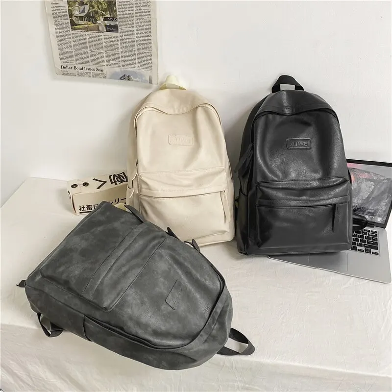 Mochilas de couro PU para homens e mulheres, bolsas simples de grande capacidade, bolsa de viagem unissex, monocromática