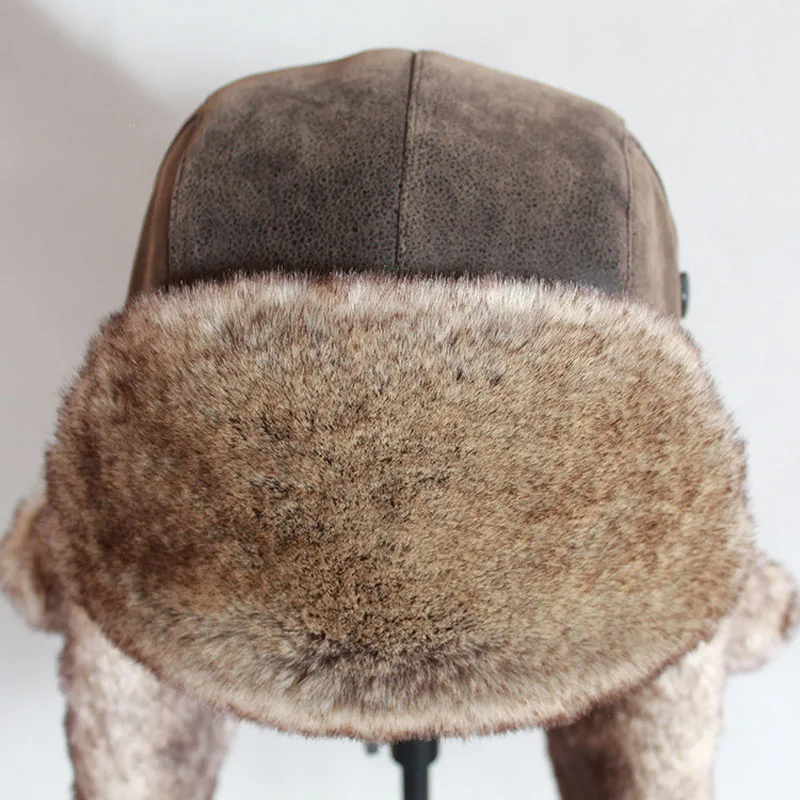 قبعات بومبر الشتاء الرجال الدافئة الروسية Ushanka قبعة مع الأذن رفرف بولي Leather الجلود الفراء الصياد قبعة إيرفلاب للنساء