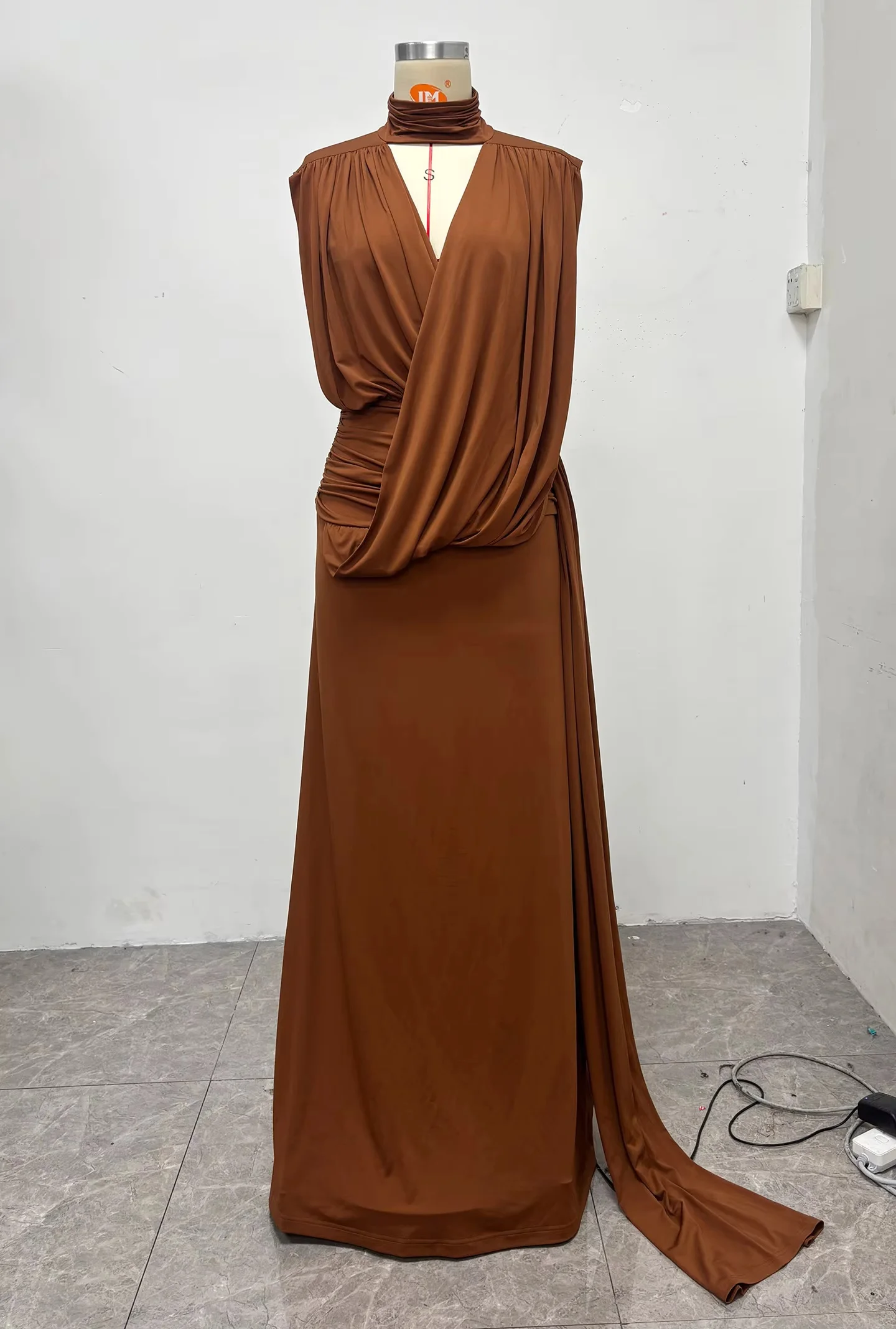 Sleeveless V-neck long gown with waist pleats and elegant side sash. Sophisticated and minimalist style. Custom sizes available,