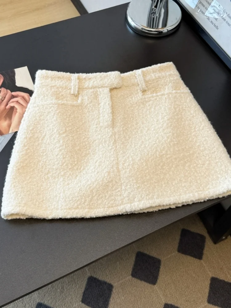 SMTHMA Schwarz-Weiß-Wollrock im französischen eleganten Stil mit niedriger Taille und blendendem Modedesign-Kurzrock für Damen