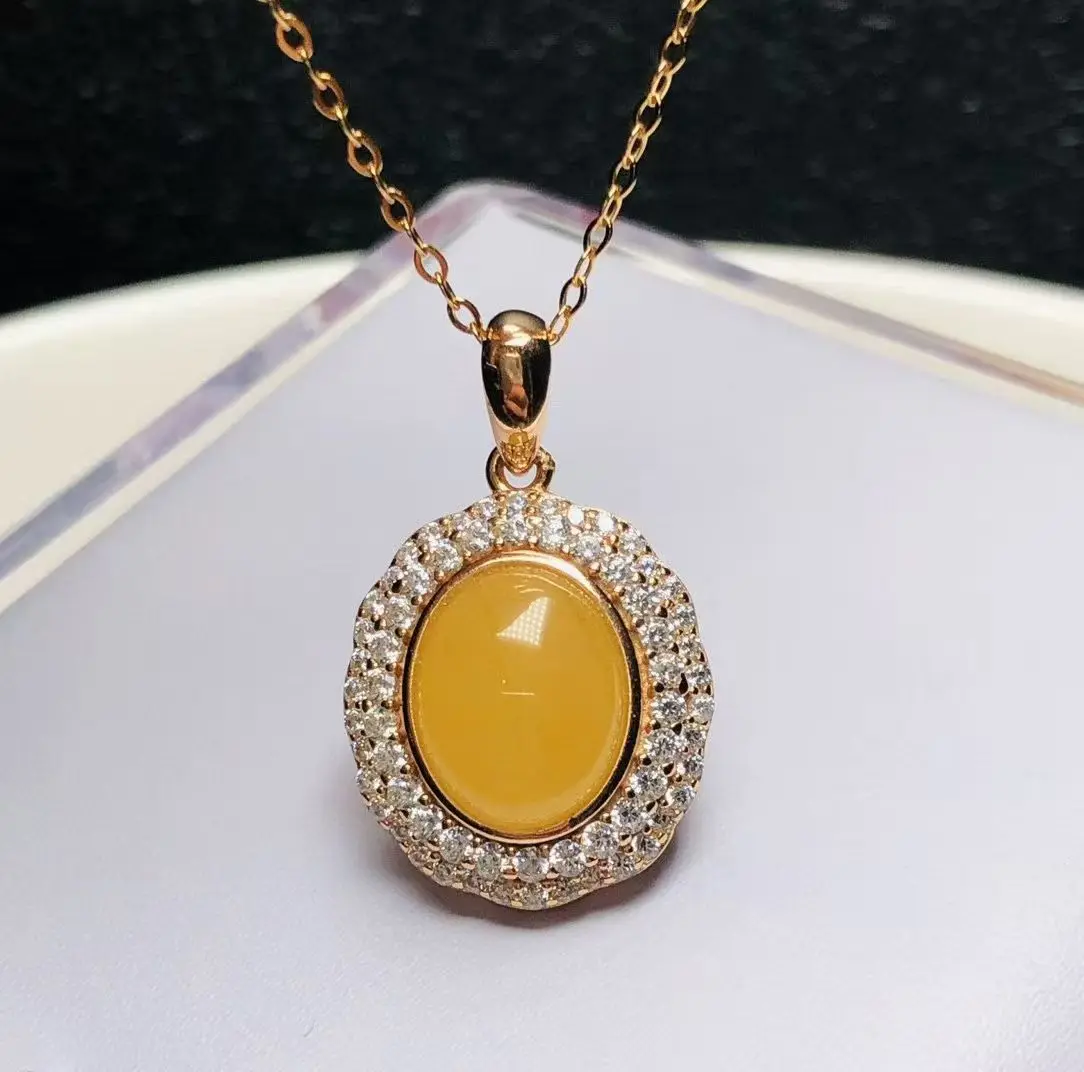 

Romantic Gift Oval Shape Amber Bee Wax Pendant 925 Sterling Silver Rose Gold Plated Oval White Zirconia Border Valentine's Day