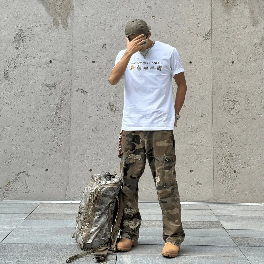 Kaus Lengan Pendek Merek Tren Amerika Sejarah Evolusi Helm Kaus Leher Kru Katun Longgar Kasual Pria Musim Panas Pakaian Jalanan