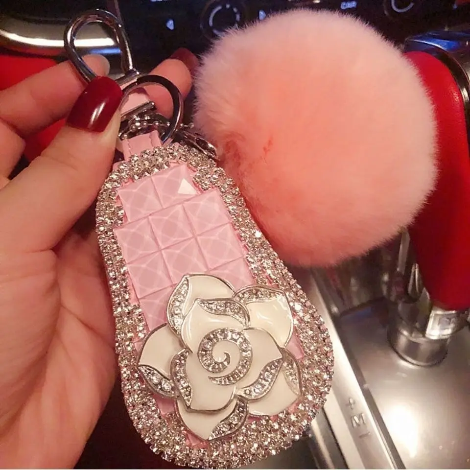 Universal rhinestone car key bag car key protective sleeve men and women pendant leather hair ball rope creative personality bag