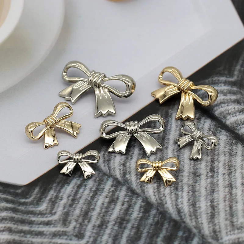 10Pcs 17-28mm Hanging plated bow tie metal button silver hollow button sweater coat button suit cardigan decorative button N207