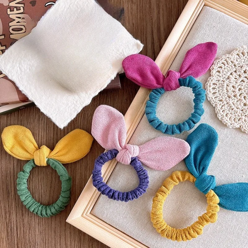 

New Korean-style color-blocking girls' fabric hair loops—high-elastic rabbit ear ponytail holders, versatile hair accessories.