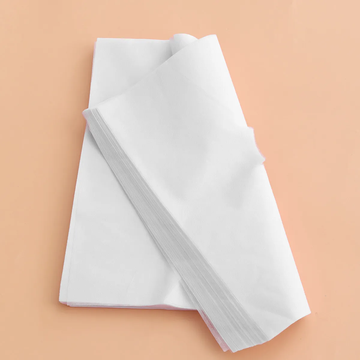 

100Pcs Women Face Massage Cover Pad Breathable Non-Woven Fabric with Silica Gel Surface for Beauty Salon Hygiene Protection