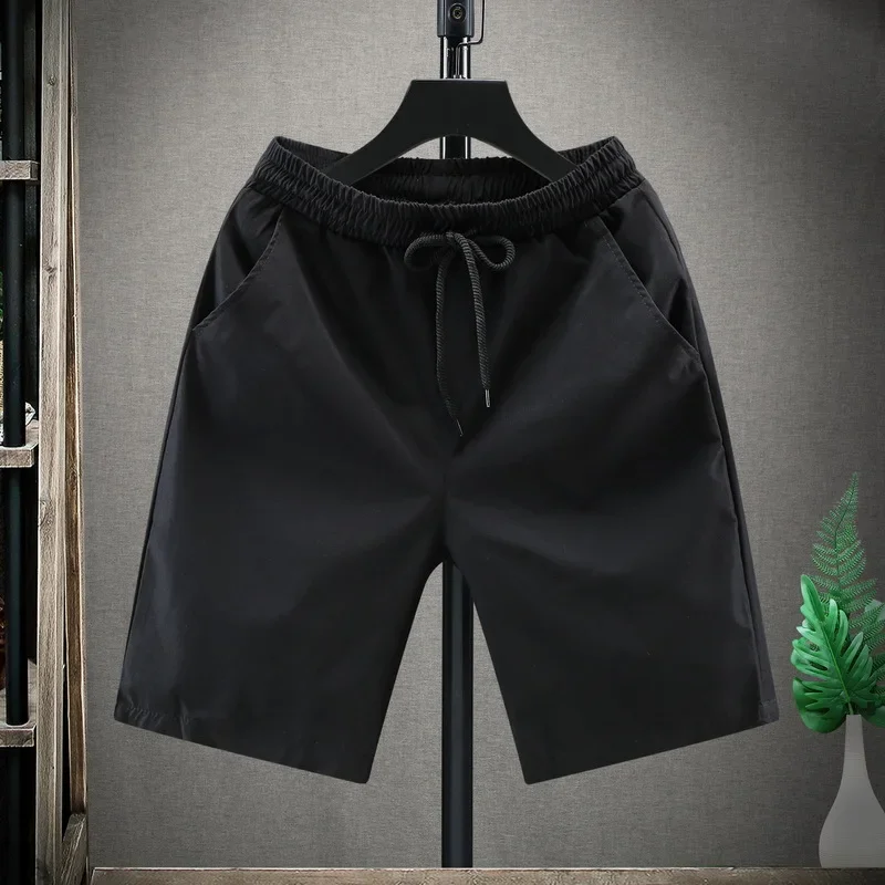 New Men's Summer Shorts Adjustable Drawstring Loose Running Shorts Solid Color Elastic Waist Men Casual Fitness Shorts for Beach