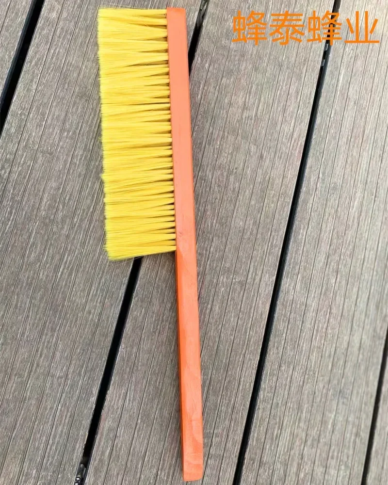 A 2PCS Red Paint Handle, Five Rows Of Yellow Plastic Wire Beeswabs, And Five Rows Of Beeswabs