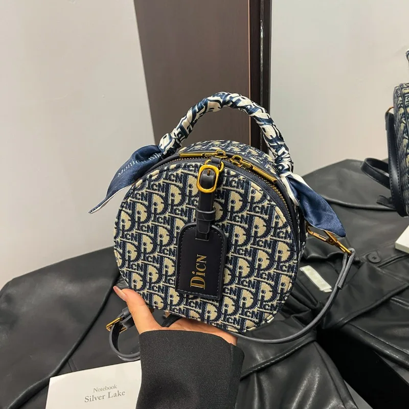 

Jacquard Embroidered Letter Series Handheld Silk Scarf 2025 New Trendy Single Shoulder Crossbody Bag Small Round Bag for Women