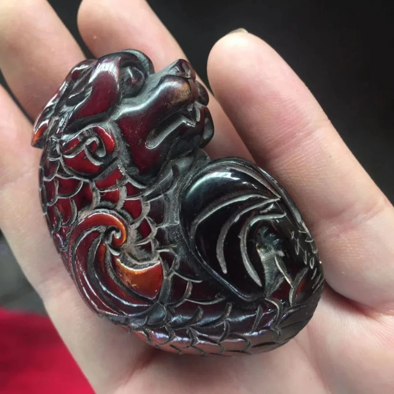 Yak Horn Pendant In Red And Crimson Color, Fish-Turned-Design, Suitable Hanging Or Carrying As A Handpiece