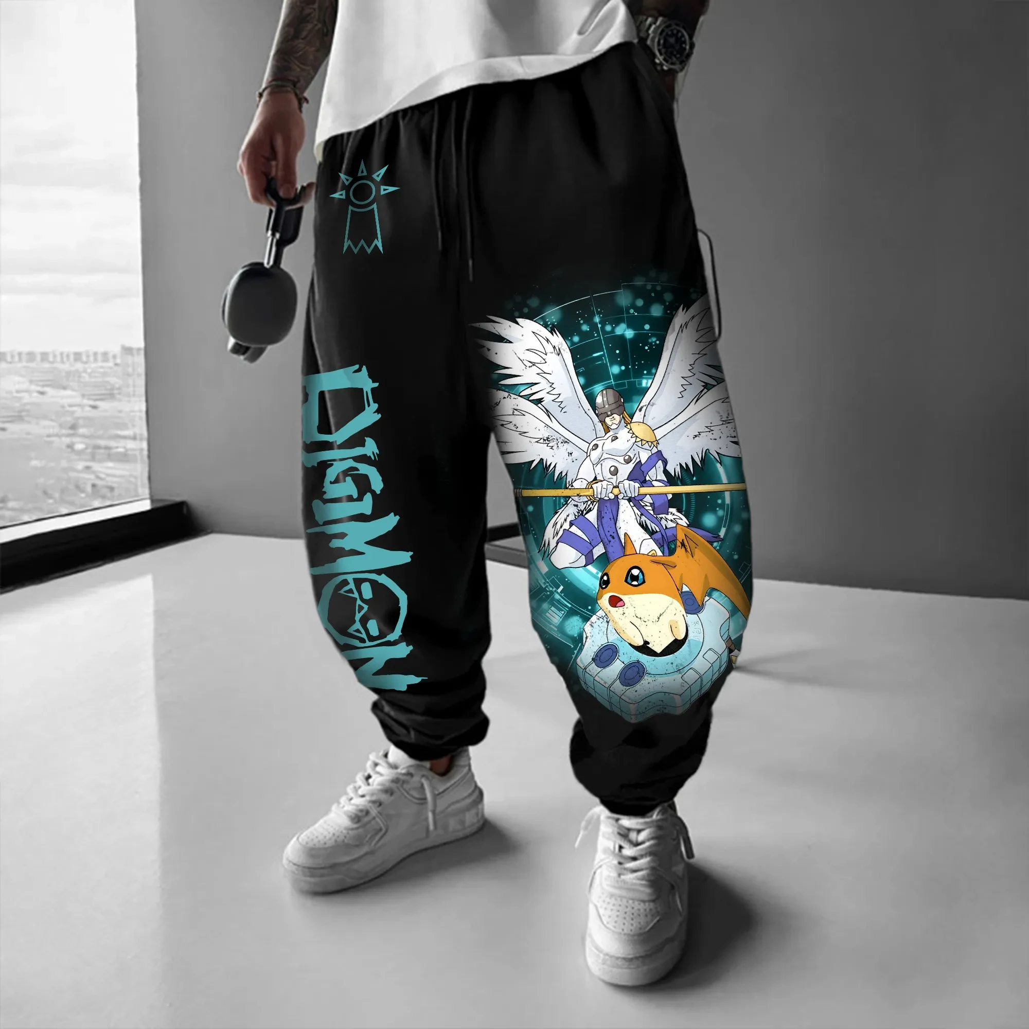 

Black Tapered Harem Joggers Pants with Digimon Anime Angelmon Patamon Colorful Print Loose Fit Cuffed Hip Hop Sweatpants for Men