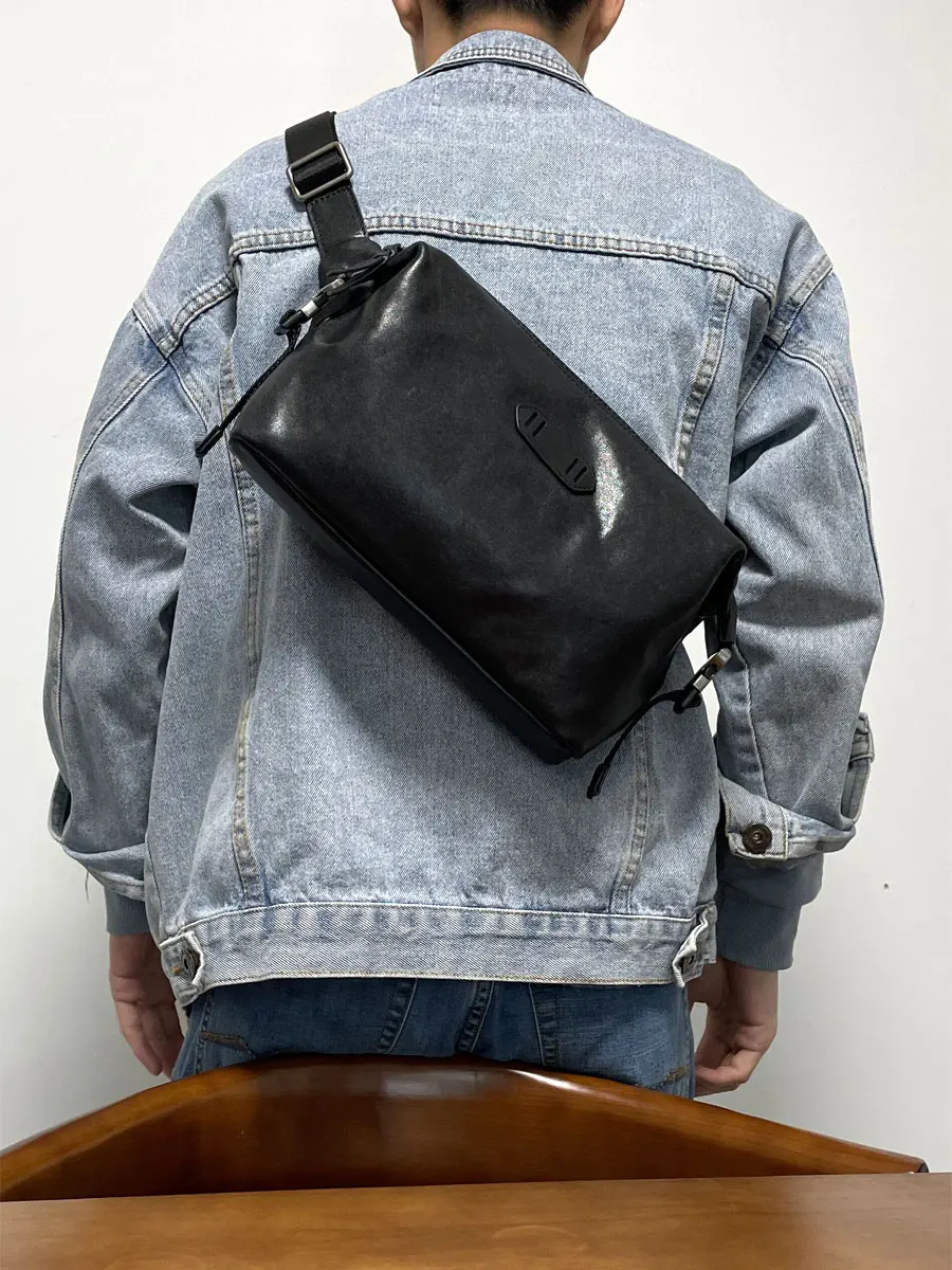 

Organizers handmade vegetable tanning cowhide men's black chest bag casual designer genuine leather teens sports crossbody bag