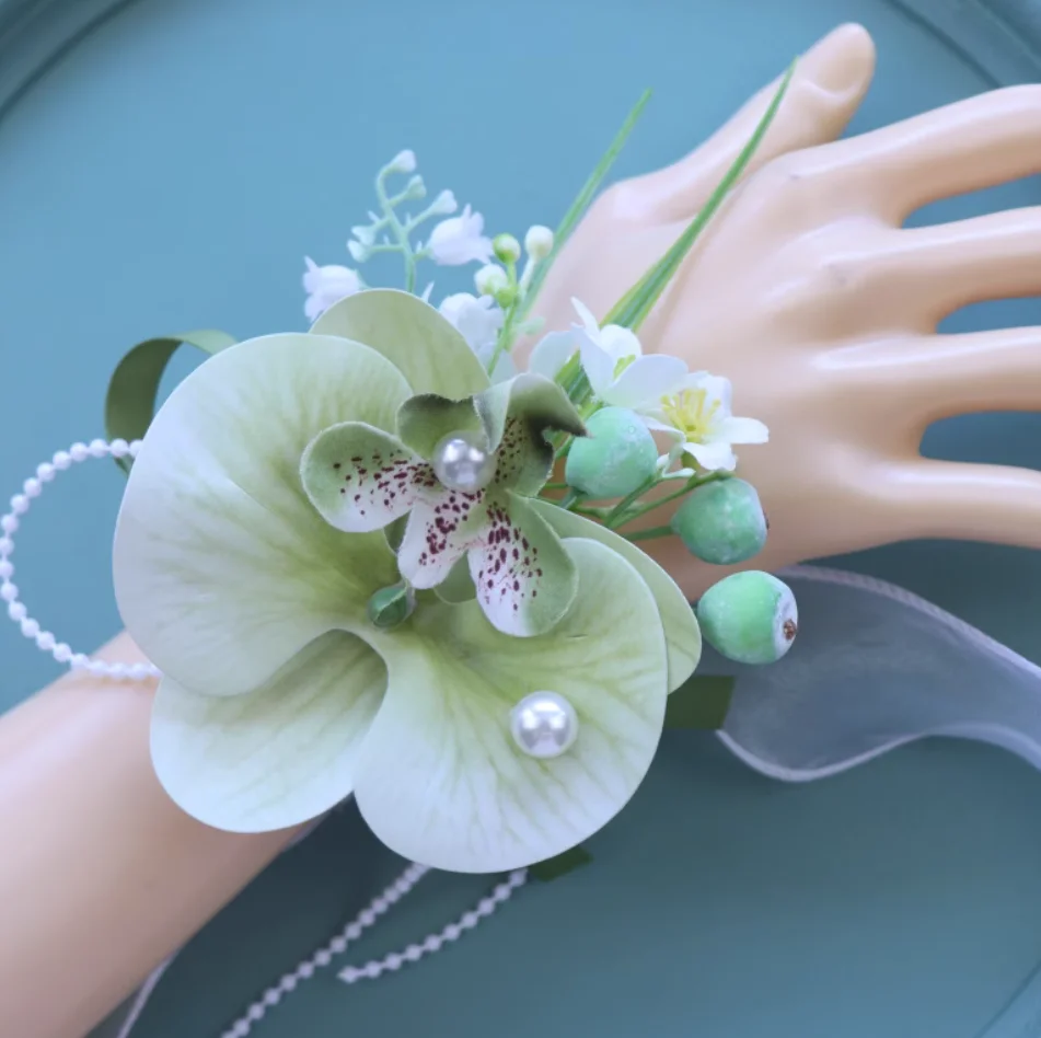 The original forest is fresh, white and green, and Phalaenopsis, the bride and groom's best man's wedding corsage magnetically a view 2