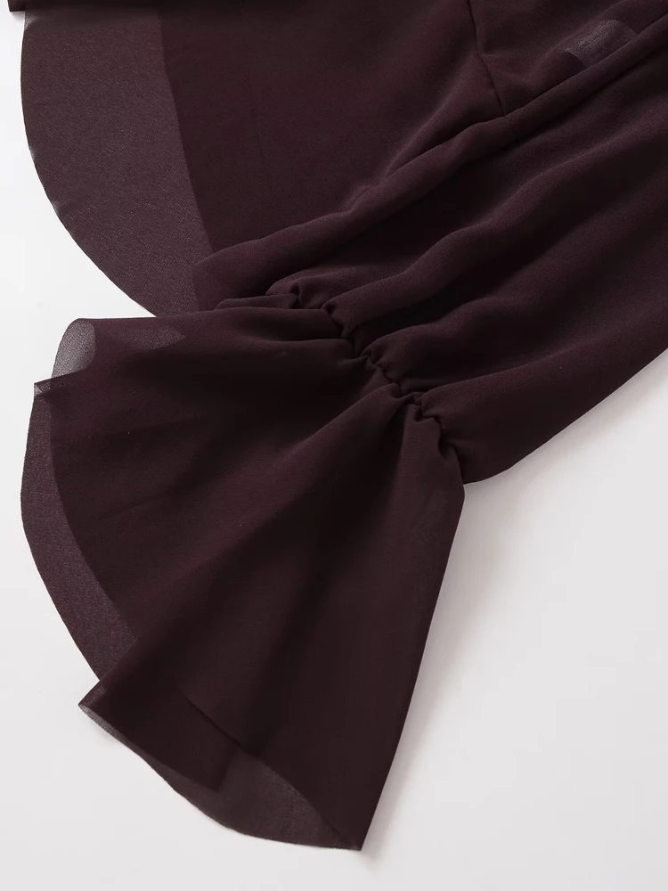 Camicetta asimmetrica semitrasparente chic da donna Camicie femminili alla moda sexy a maniche lunghe con fiocco sul retro