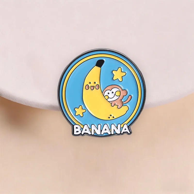 Cute Monkey Hanging on Banana Enamel Pin Cartoon Fruit Style with Starry Background for Kids and Whimsical Adults Daily Wear
