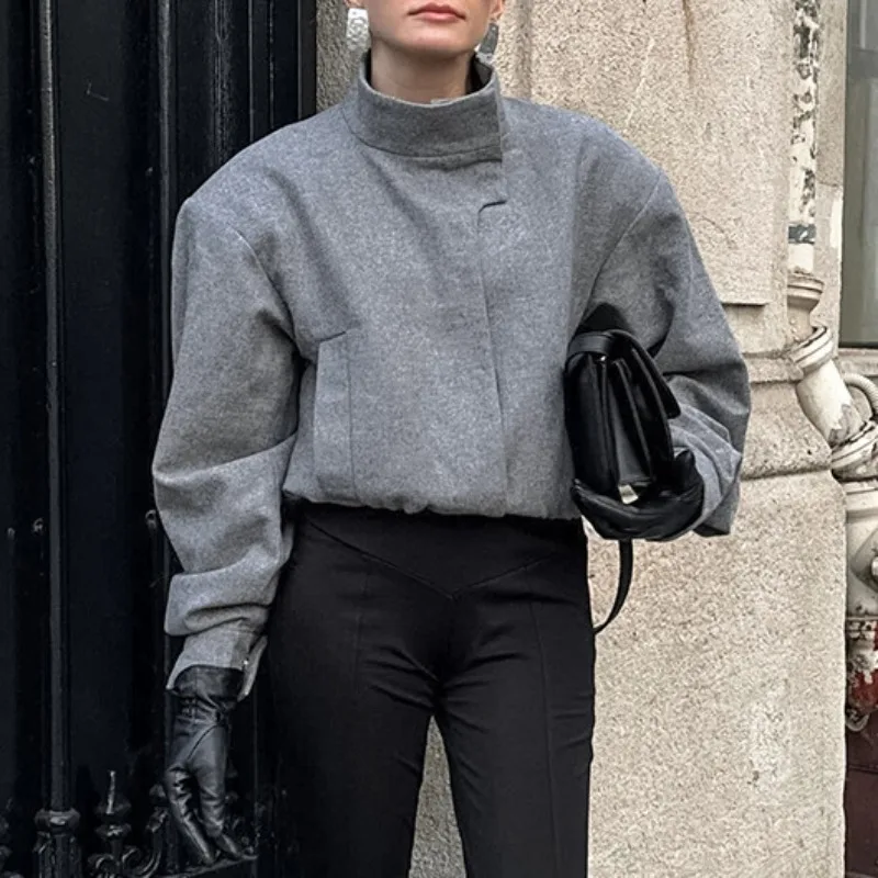 

Новое короткое свободное шерстяное пальто в осенне-зимнем стиле с небольшим воротником-стойкой и женским пальто в трансграничном стиле с откидной спинкой.