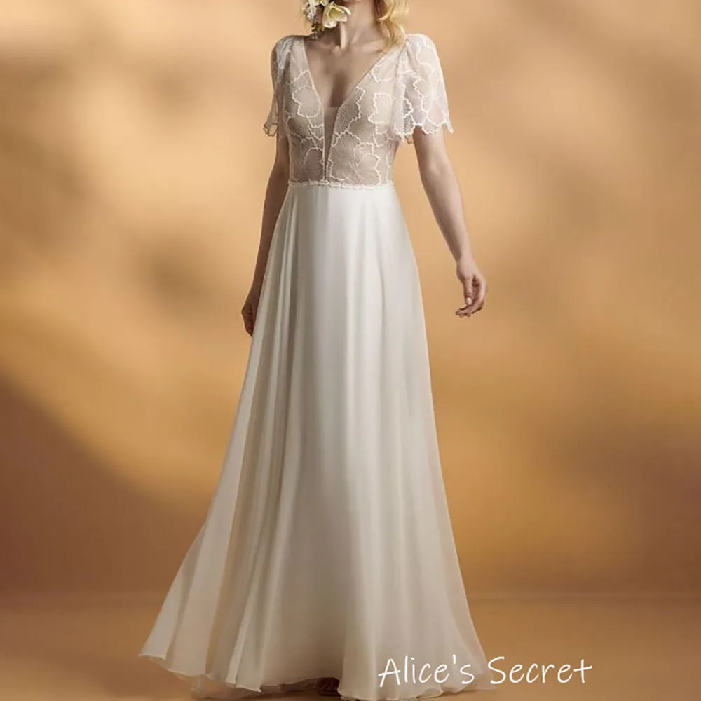 A-Line Boheme Tulle V Neck Short Sleeves Open Back Pleated See Through Full Length Sweep Train Wedding Dress Robe de Mariée