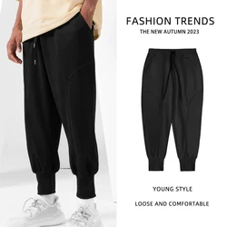 European and American youth loose fitting casual sports pants men's solid color running training pants straight pants menswear