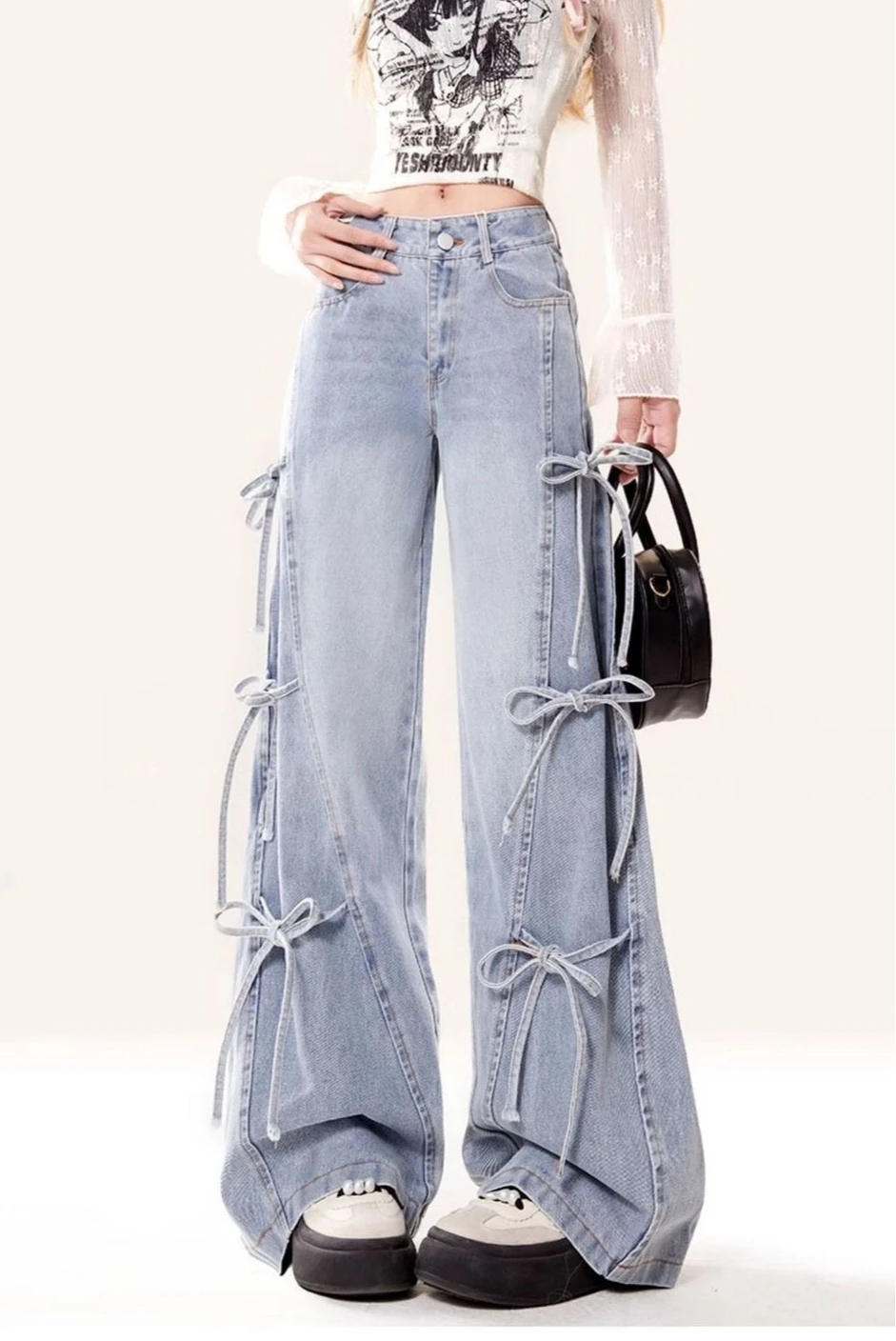 Jesienne nowe sznurowane dżinsy z muszką, damskie amerykańskie retro wszechstronne luźne spodnie z szerokimi nogawkami do podłogi