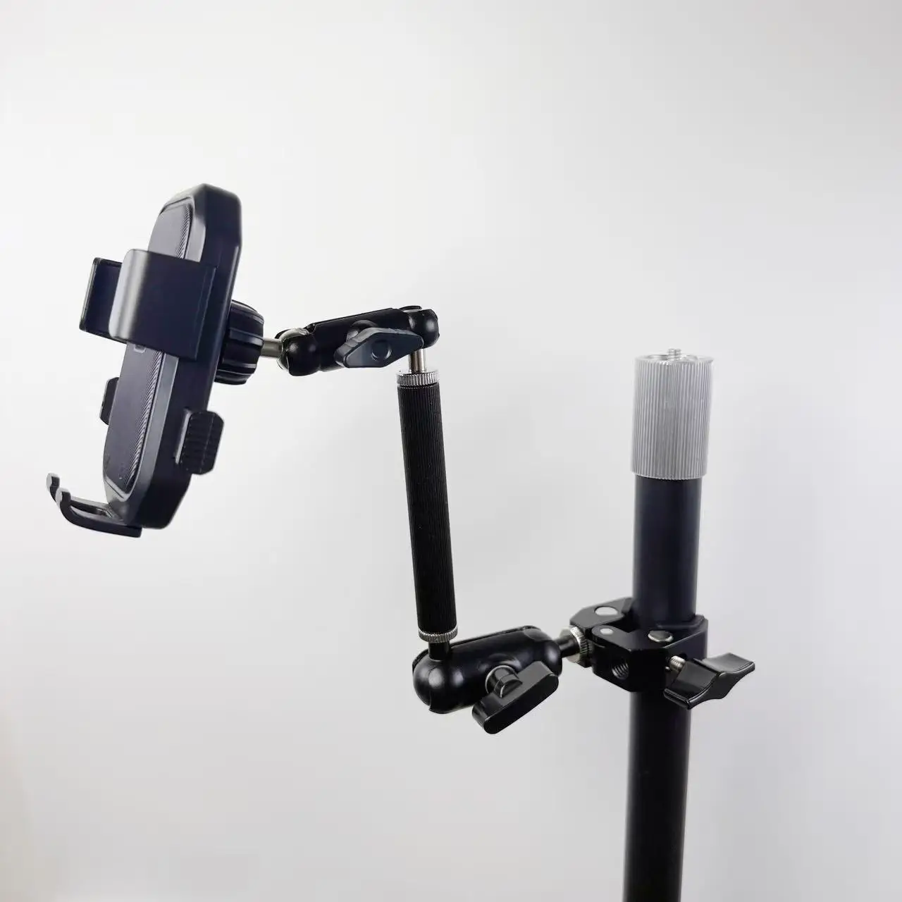 

Rotating Joint Extended Aluminum Rod Adjustable Phone Holder Universal Desktop Clamp Suitable for round Tubes And Desktop