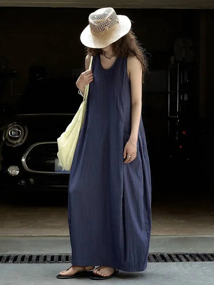 HUISONG femmes kaki brève poche décontracté longue élégante bourgeon robe nouveau col rond sans manches mode marée printemps été 2025 pr3inq