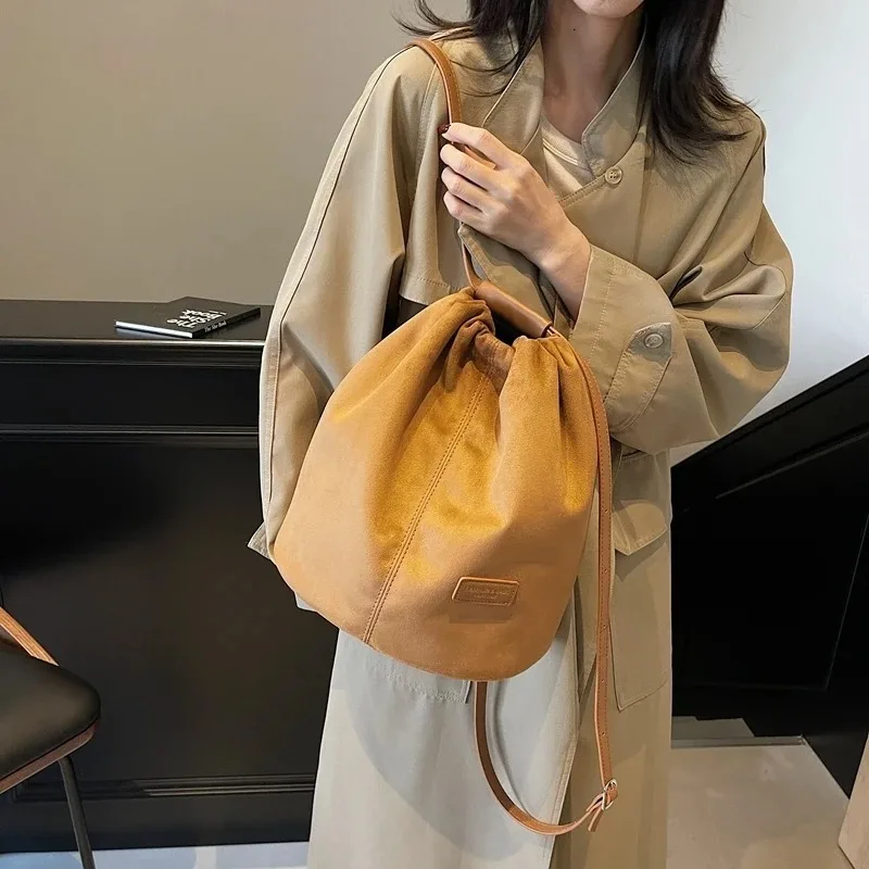 

2025 Latest Women Fashion Backpacks Drawstring Bucket Shoulder Bags Soft Suede Large Capacity Rucksack For Travelling Shopping