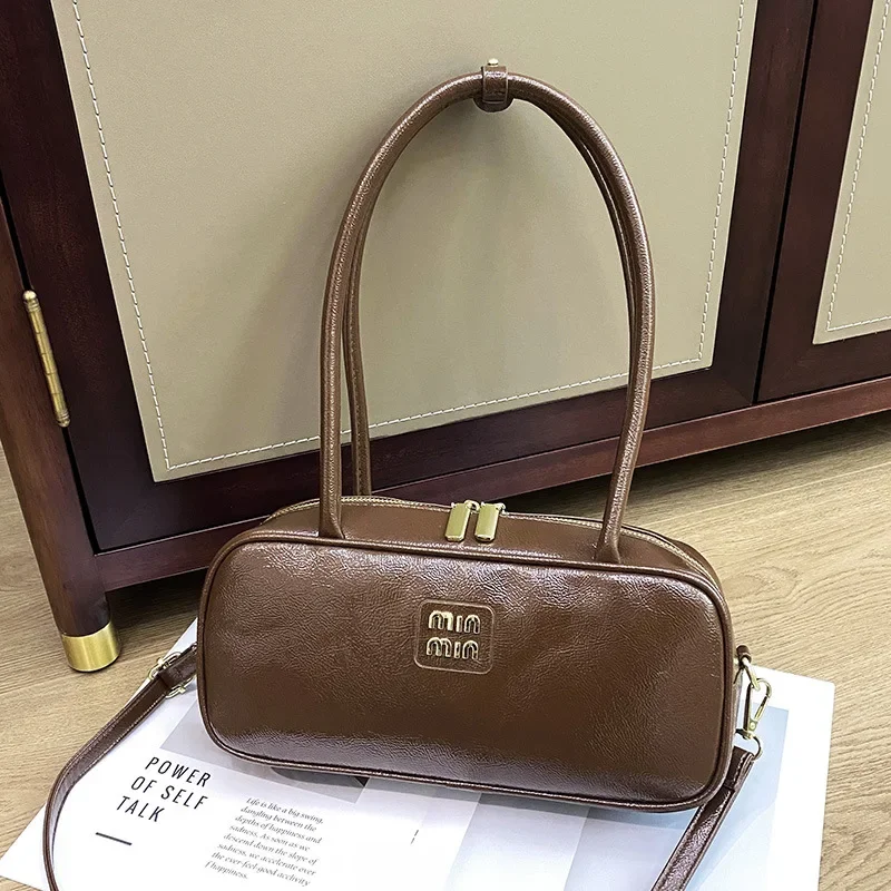 Elegante borsa a tracolla da donna in tinta unita 2025 Borsa a cuscino Boston di nicchia per eventi sportivi, campus universitari e pendolari quotidiani