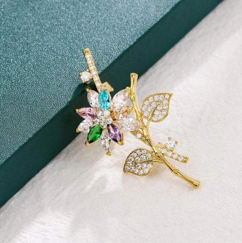 เข็มกลัดแฟชั่นเพทายรูปดอกไม้แฟชั่นคลาสสิกสีสันสดใสของผู้หญิงเข็มกลัดเย็นสุดสร้างสรรค์ของขวัญ aksesoris Bros