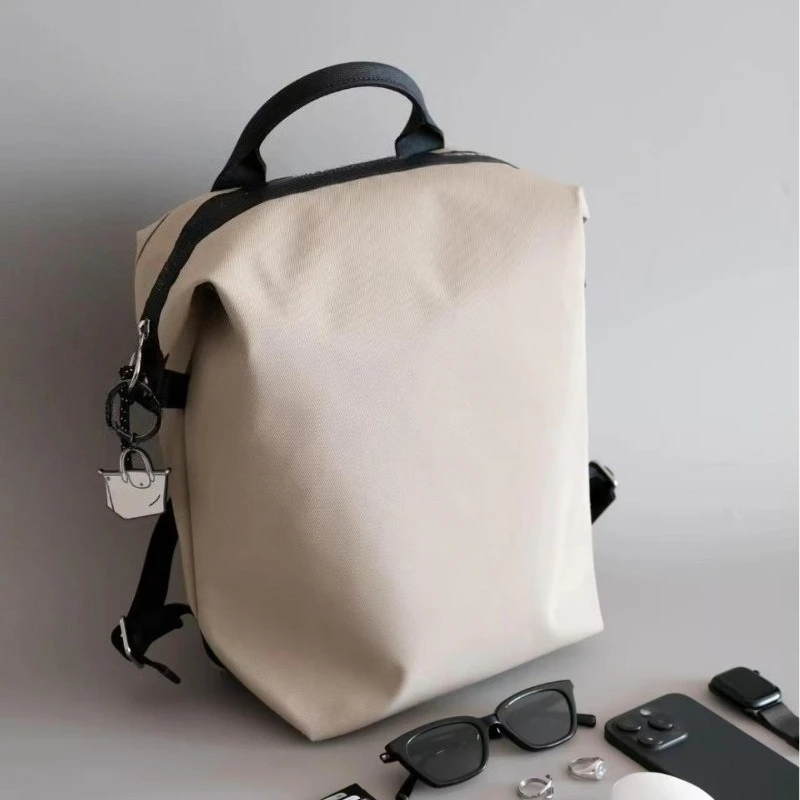 

Fashionable and trendy nylon backpack for both men and women, large capacity bag, lightweight and short distance travel backpack