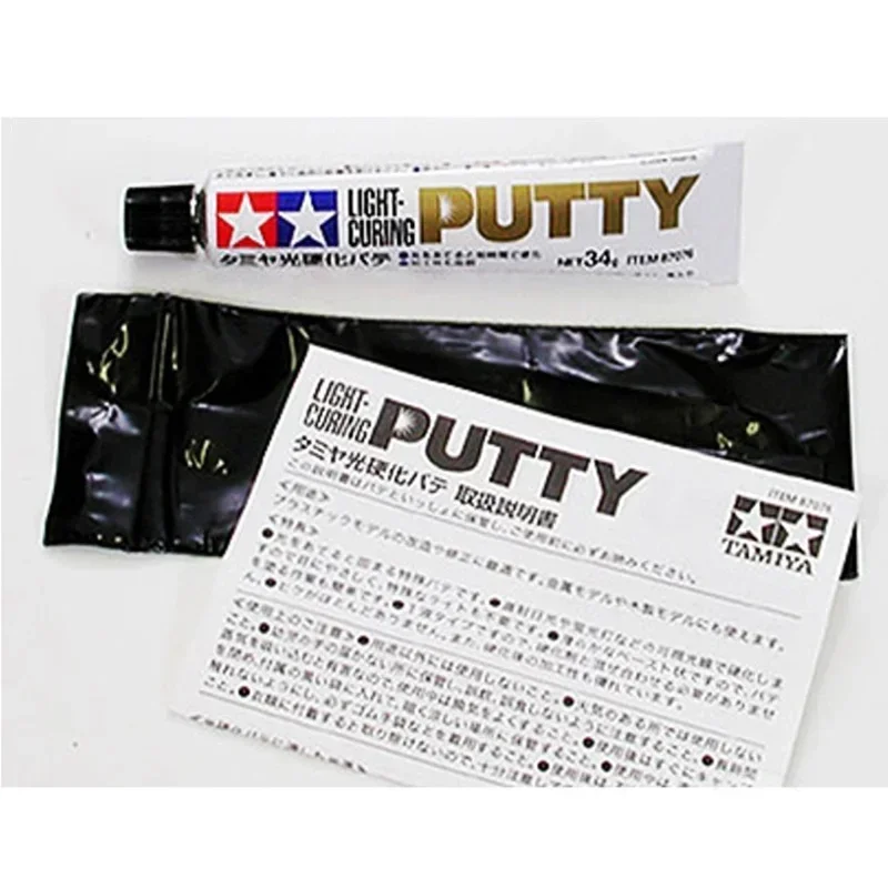 Tamiya 87076 Mastice fotopolimerizzabile Modello ad asciugatura rapida Riparazione Parti di riempimento per strumenti di costruzione di modelli in plastica Accessori fai da te 34g