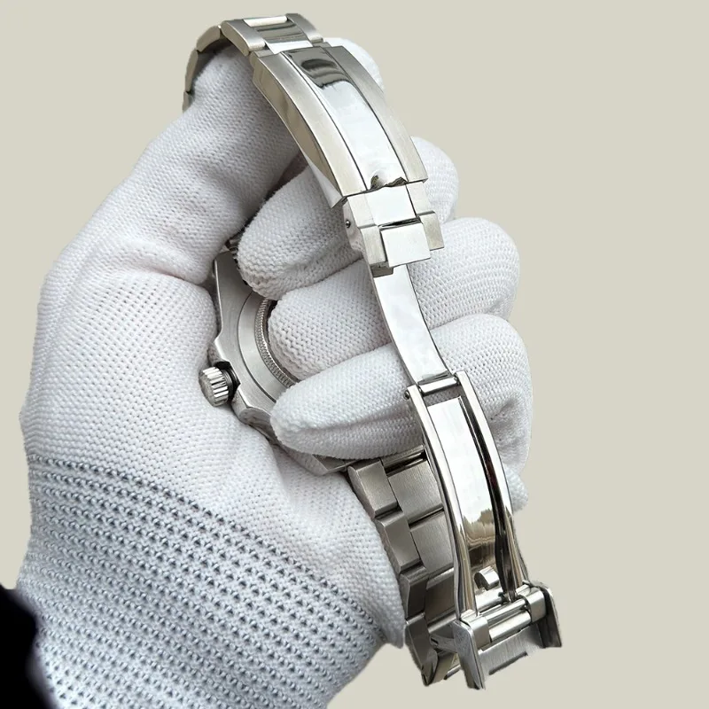 قم بتجميع مجموعة كاملة من حزام الفولاذ المقاوم للصدأ 316 لساعة NH35 بطول 100 متر مقاومة للماء من زجاج الياقوت المضيء الحرفي