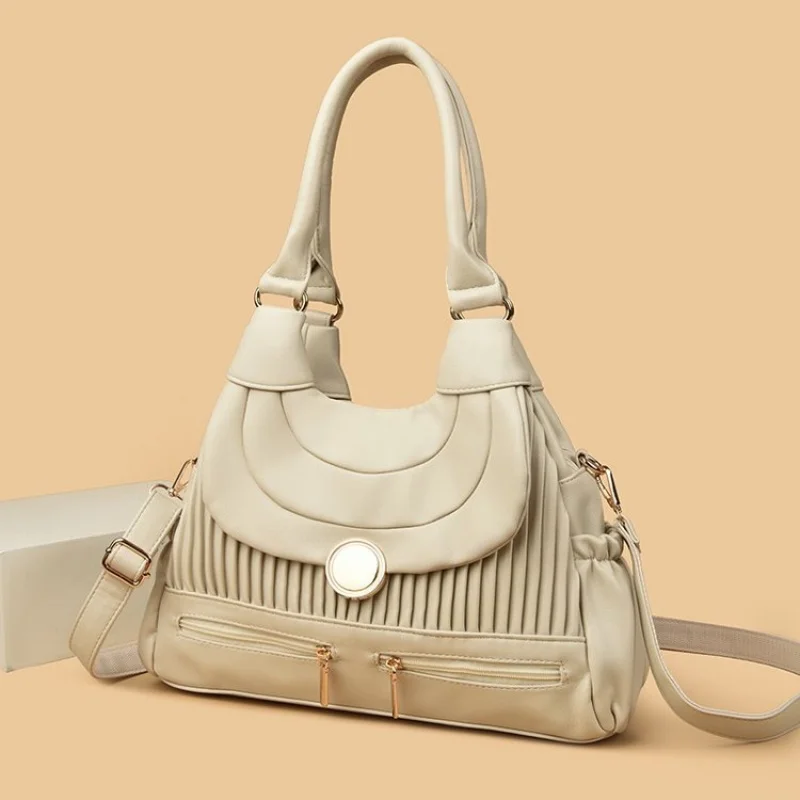 

Classic Leather Shoulder Bag For Ladies, By Famous Designer With Roomy Interior, Durable And Stylish For Work Or Social