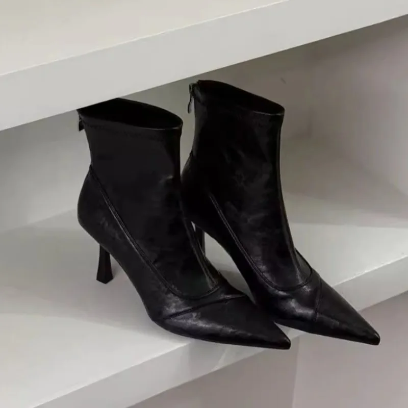 العلامة التجارية مصمم 2025 المرأة شتاء جديد بولي PU مقاوم للماء تشيلسي الأحذية اليومية عادية تنوعا المرأة خنجر الكعب حذاء من الجلد