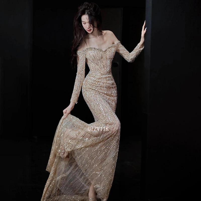 シャンパンパーティーイブニングドレスエレガントな女性の恋人ストラップレスマーメイド長袖セレブ特別な日のウエディングドレス