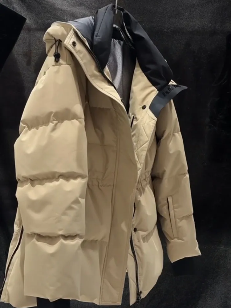 Unico chic beige con cappuccio ingombrante in vita Jaet da donna di media lunghezza inverno 2025 New Sle Commuter versione coreana Thiene...