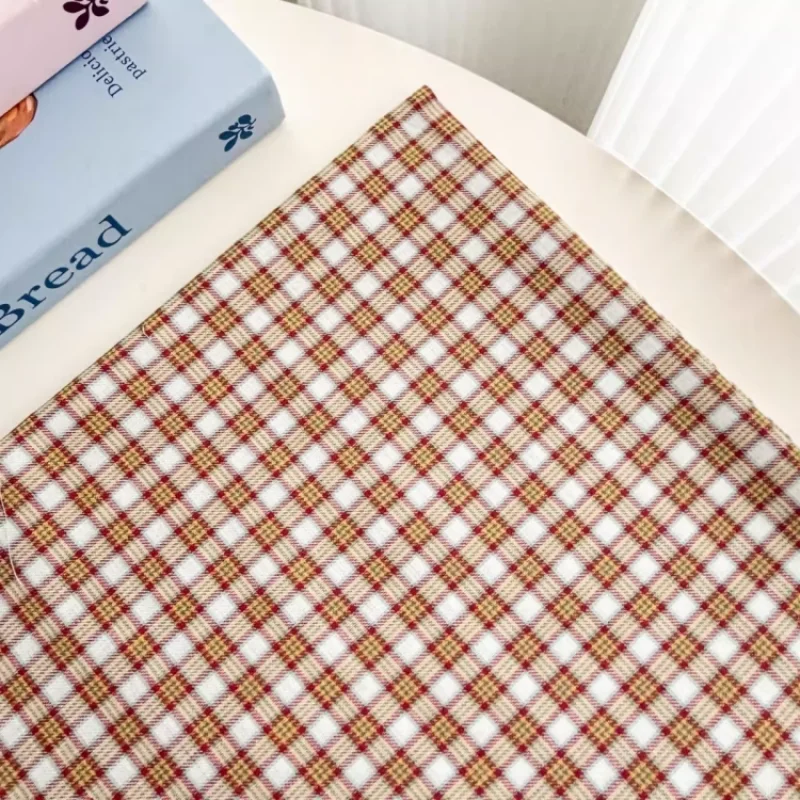 

Multi colored checkered fabric, used for making hair rings, clothing jackets, tablecloths, and other fabrics.