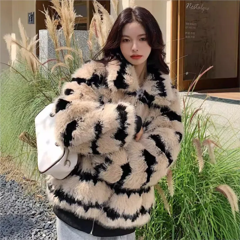 A long wavy fur coat and striped top for women